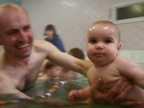  . . Baby swim. Swimming pool.